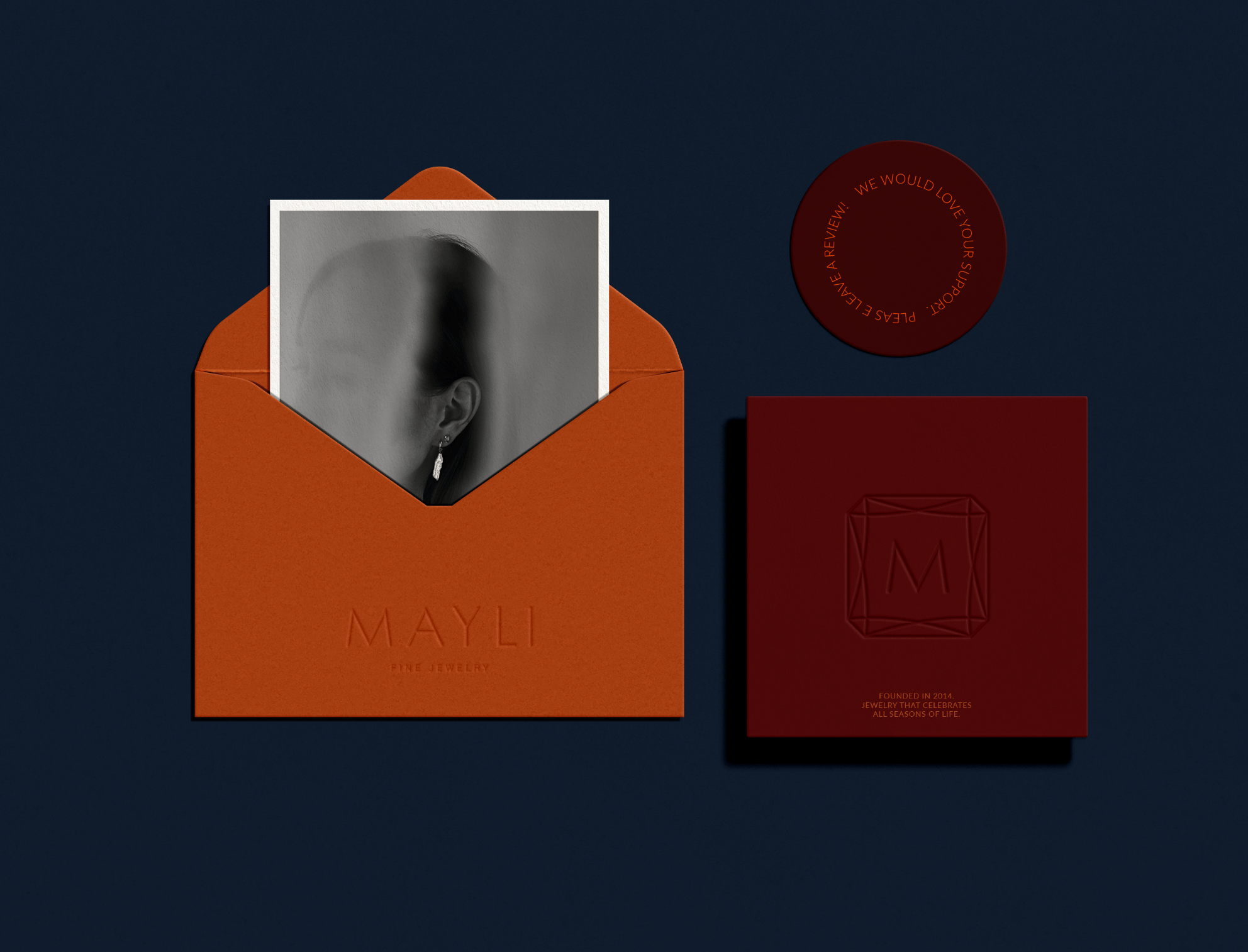 Stationery design of letterhead and business cards for the company Anders on top of a blurred photo of a house interior.