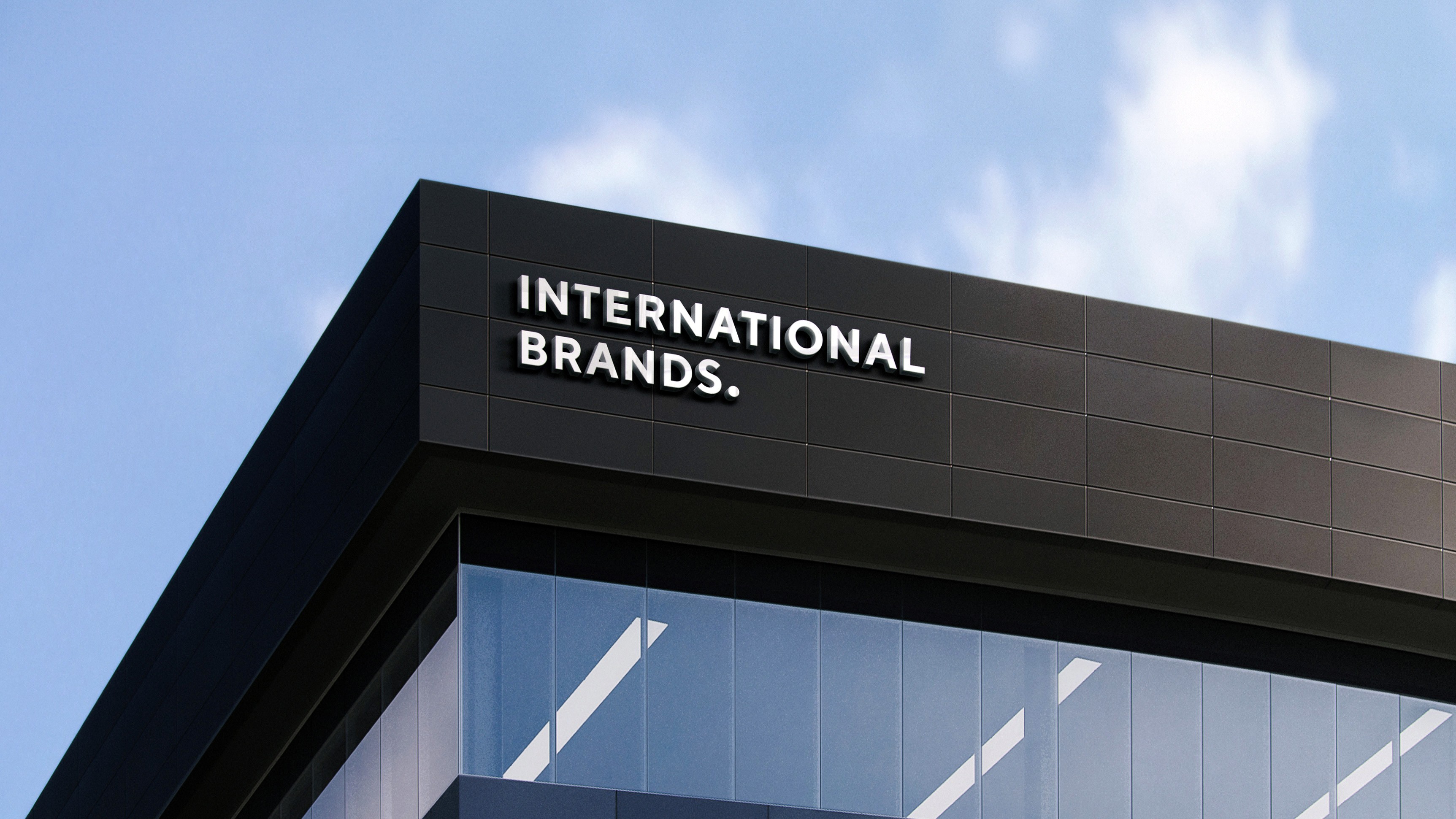 Stationery design of letterhead and business cards for the company Anders on top of a blurred photo of a house interior.