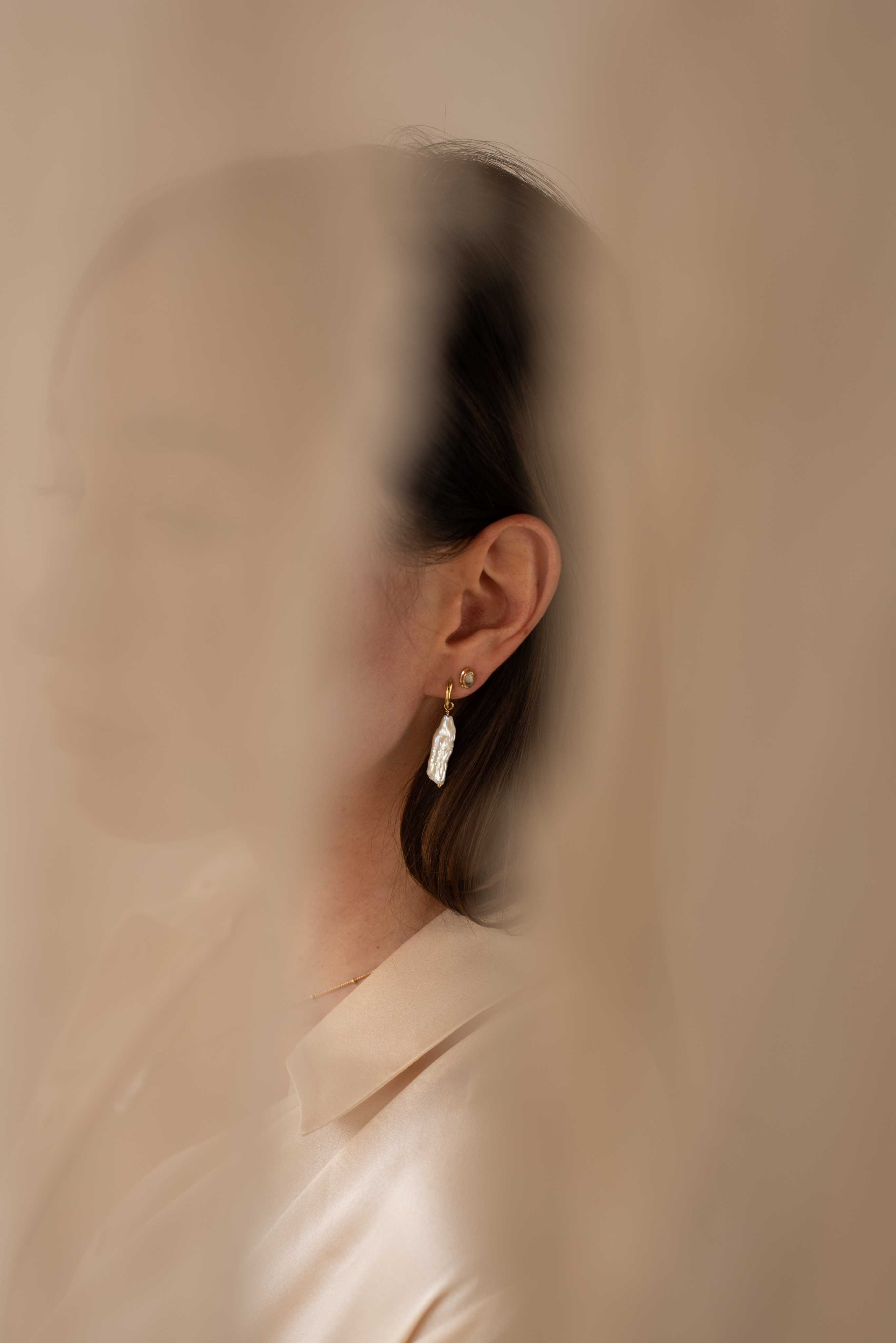 Graphic depicting UI-styled buttons with different categories of interior design items on top of an image of a modern interior living room.