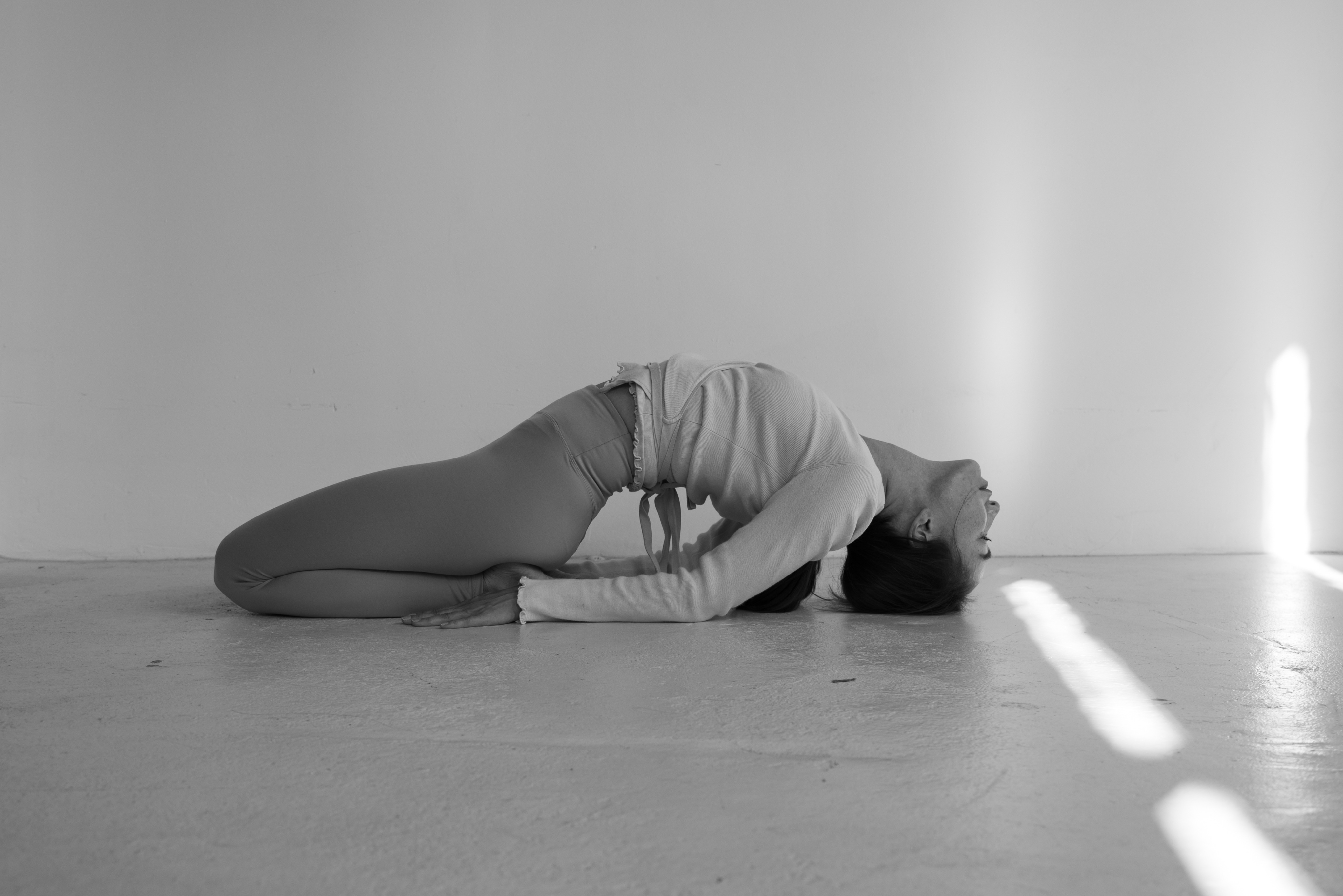 Stationery design of letterhead and business cards for the company Anders on top of a blurred photo of a house interior.