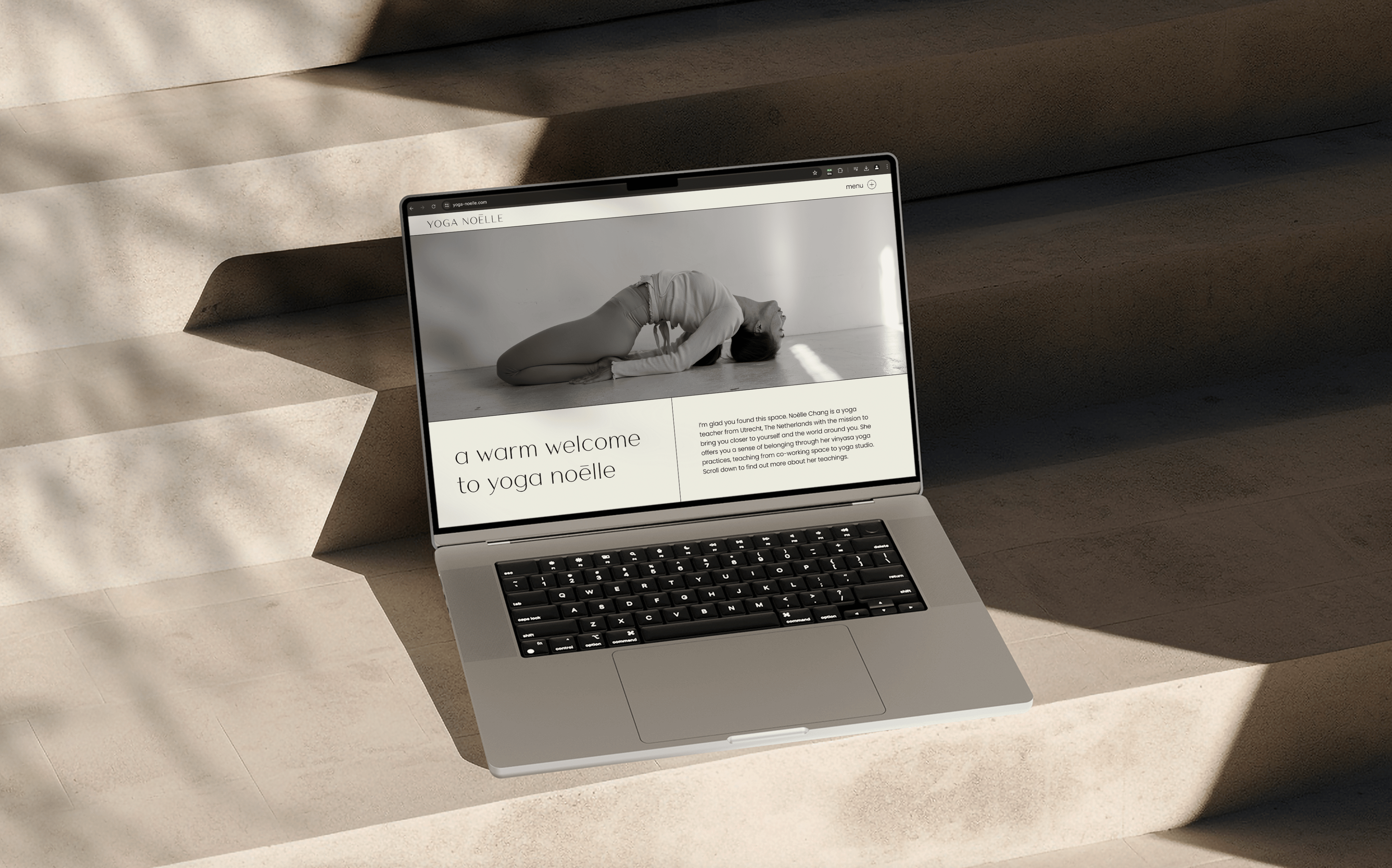 Stationery design of letterhead and business cards for the company Anders on top of a blurred photo of a house interior.